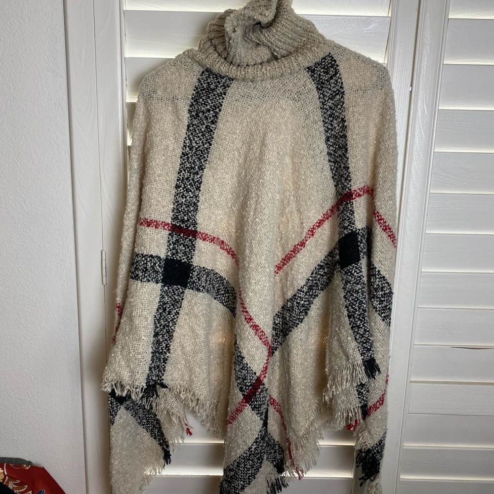 Never worn poncho!
